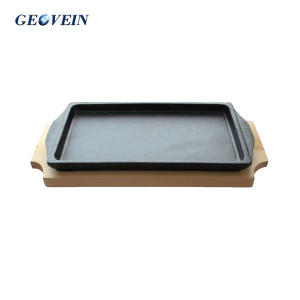 Rectangular cast iron steak grill pan sizzling plate with wooden tray