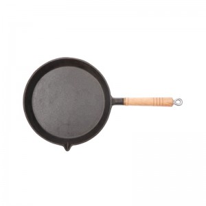 cast iron cooking pan with wooden handle