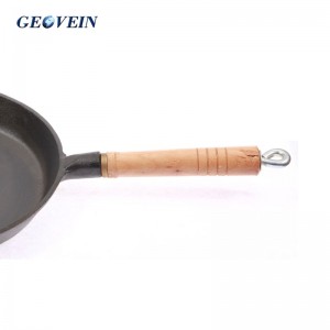 cast iron cooking pan with wooden handle